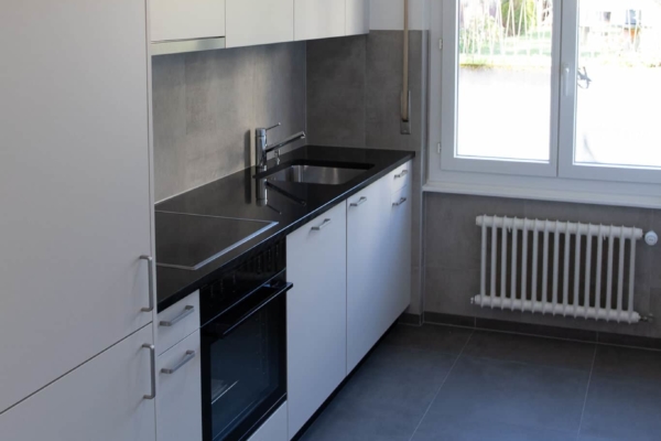 Rénovation d'une cuisine avec sol en carrelage à Pully près de Lausanne