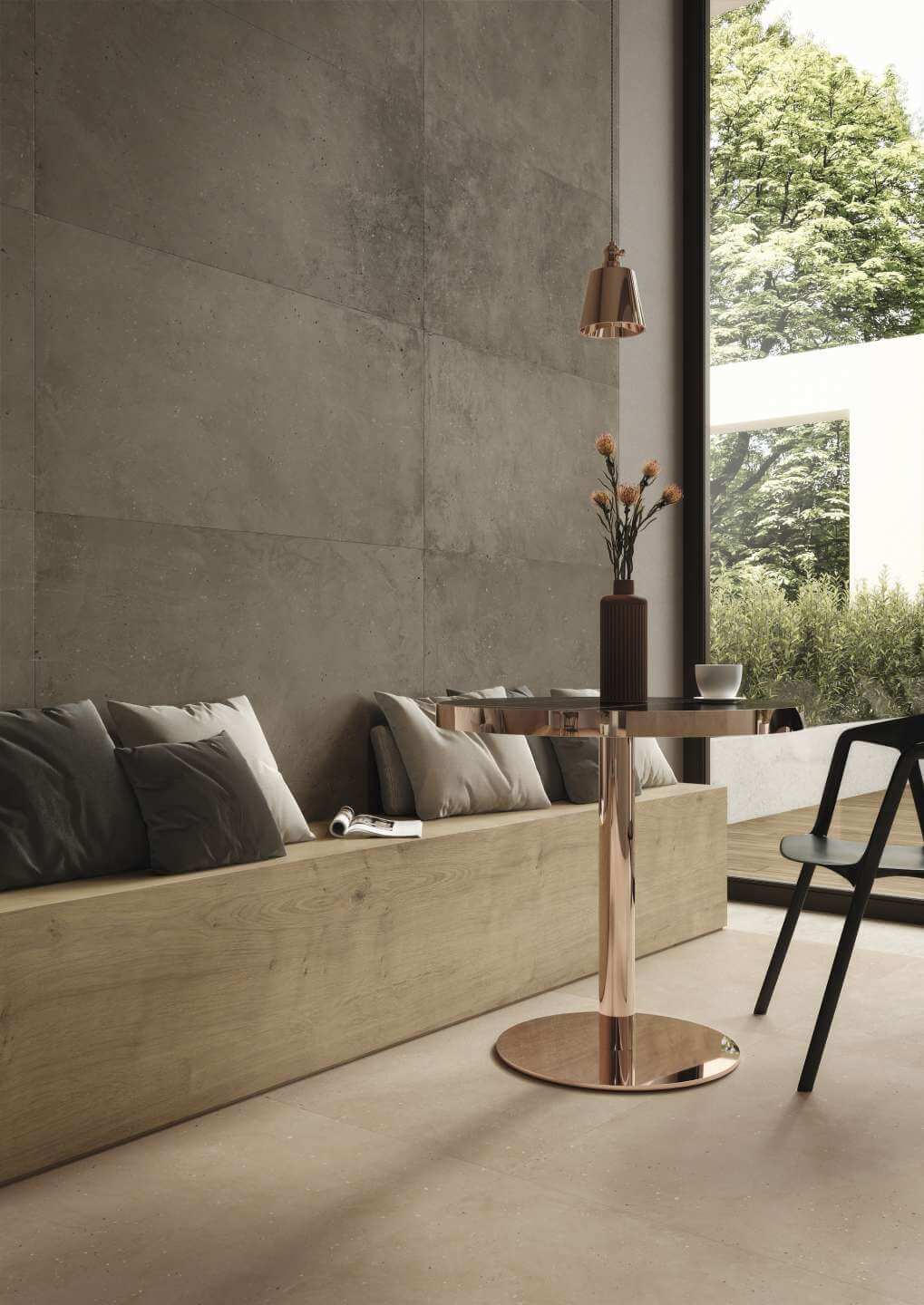 Stardust 2 Séjour avec banquette en bois , table en métal, carrelage Imitation béton Stardust terra au sol et Stardust Ground au mur
