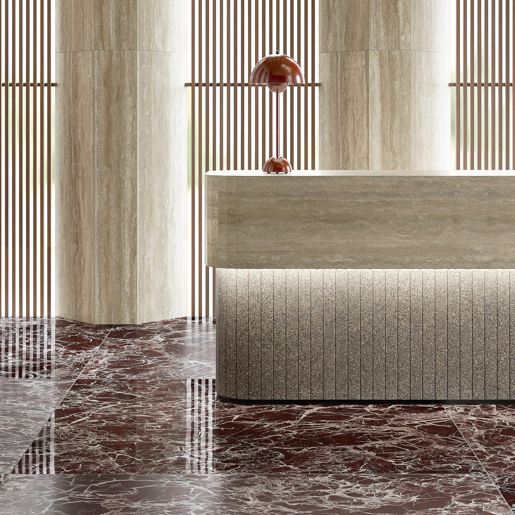 Marmi Maximum Lepanto Rubino 4 Vue rapprochée d'un espace de lobby avec podium en marbre beige et base décorative en marbre Marmi Maximum Lepantino Rubino, sols et murs coordonnés en marbre riche veiné.