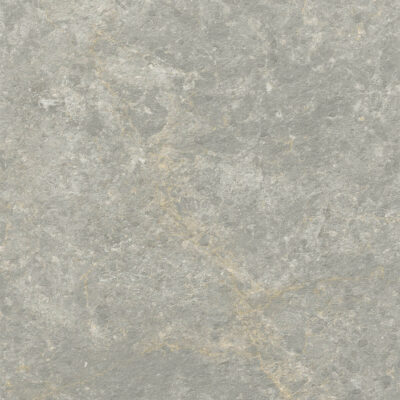 Pulsar Gravel, carrelage imitation pierre inspirée par la surface de la lune. Le carrelage est dans des nuances grise allant du beige clair à du gris.